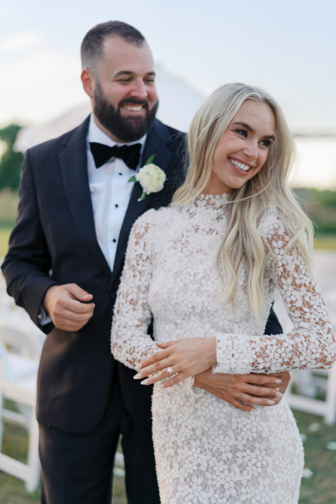 South Carolina bride and groom laughing with one another on their wedding day